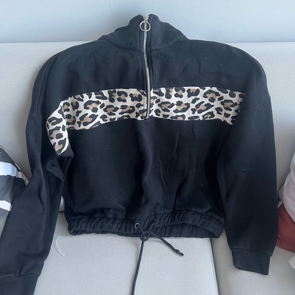 Black hoodie with leopard line on the front
